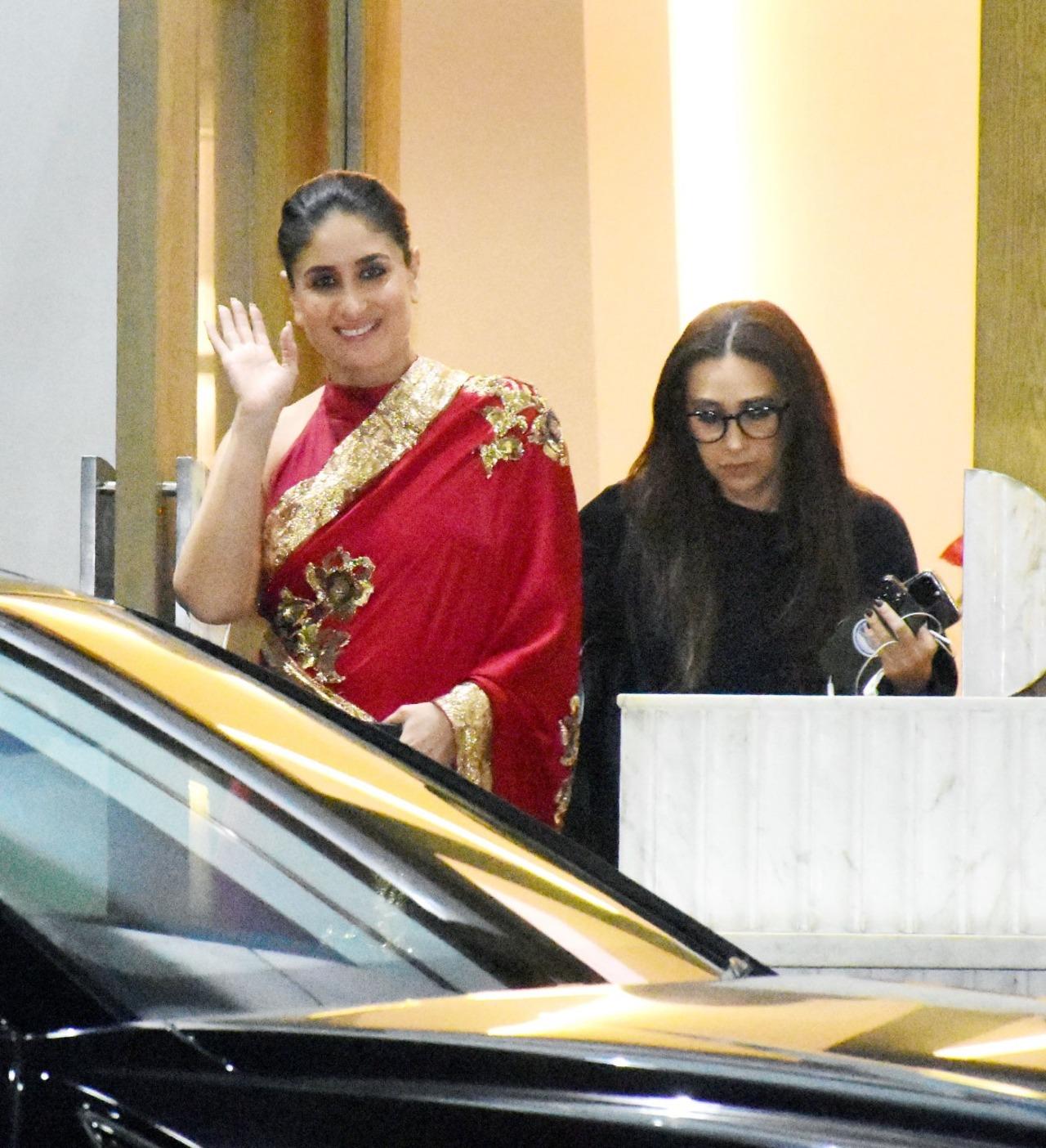 The famous Kapoor sisters, Kareena Kapoor Khan and Karisma Kapoor were also spotted at the airport. Kareena looked elegant in a red saree with floral prints, while Karisma kept things casual with a black hoodie